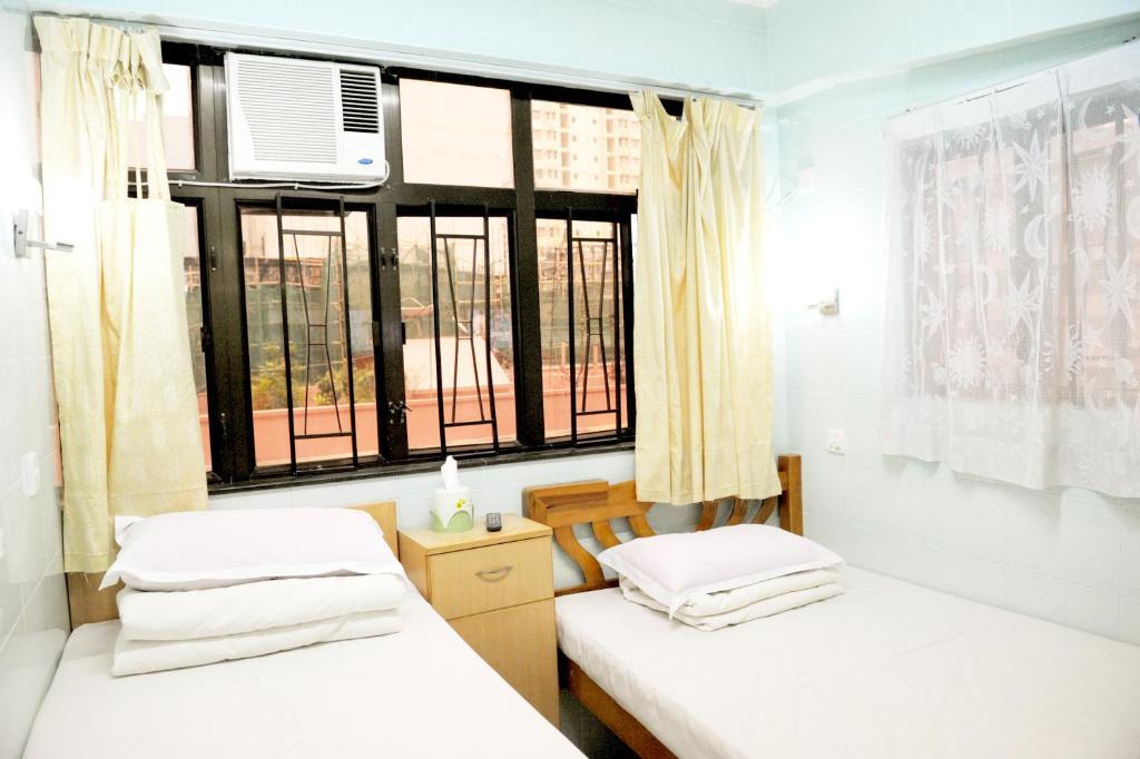 Oi Suen Guesthouse Hongkong Værelse billede