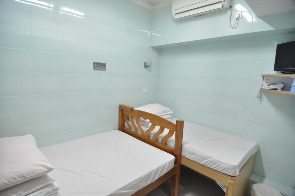 Oi Suen Guesthouse Hongkong Værelse billede