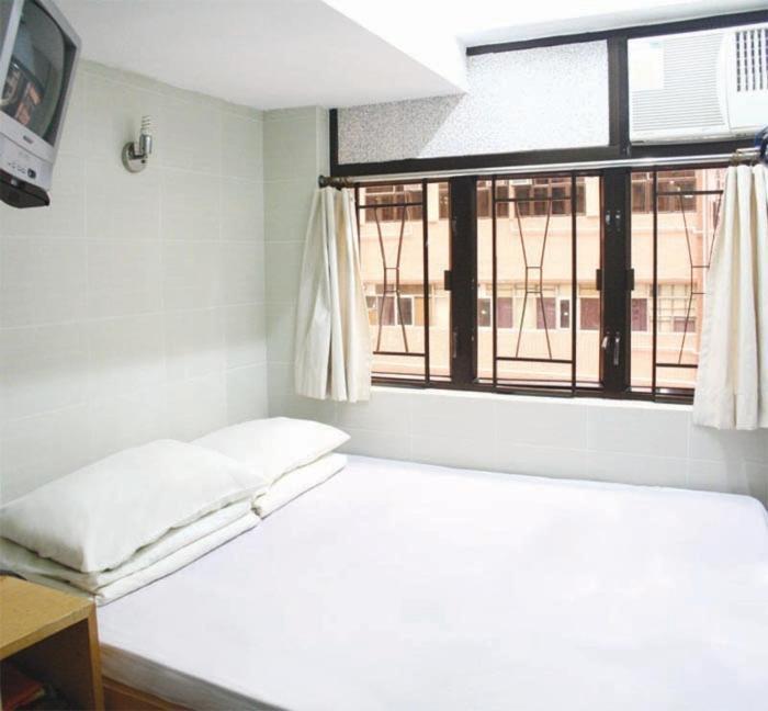 Oi Suen Guesthouse Hongkong Værelse billede